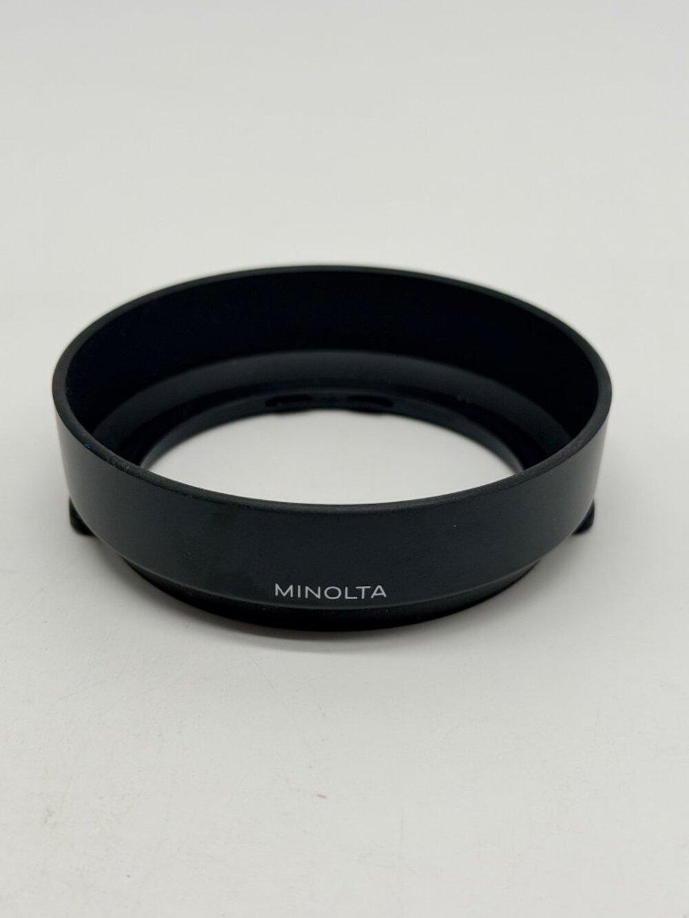 Minolta snap-on plastic lens hood specifically designed for the 35-70mm f/4 AF "
